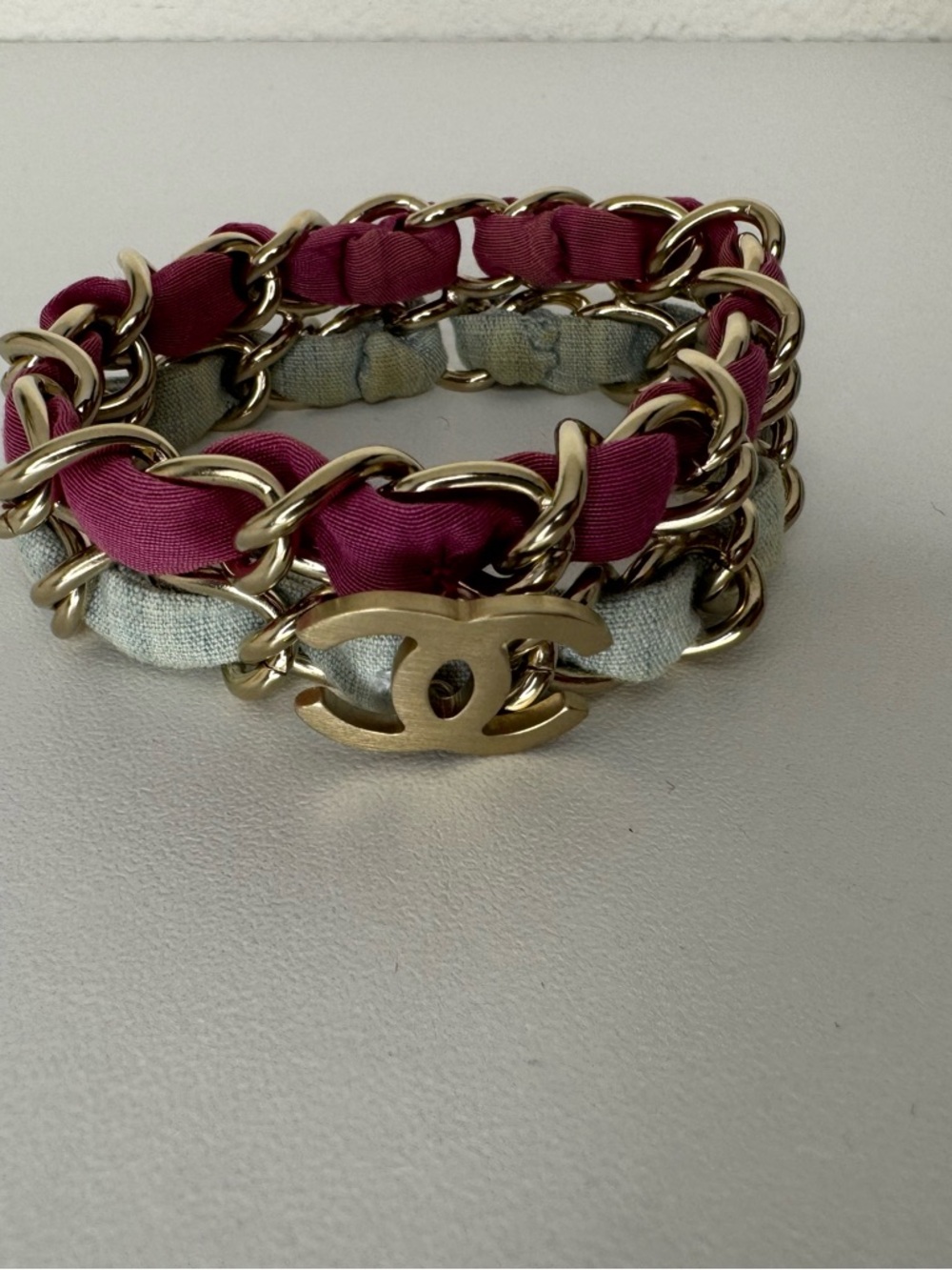 CHANEL Gold-Tone Chain Bracelet with Pink and Cream Fabric Weave